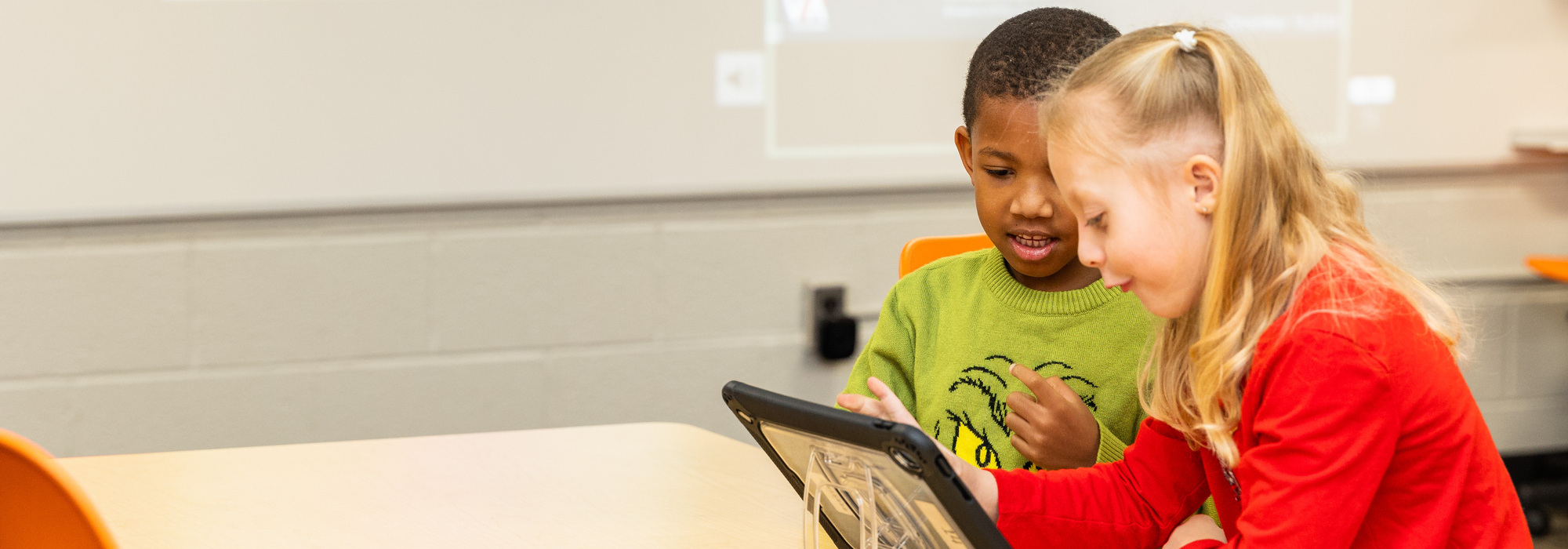 Students with tablet in STEM