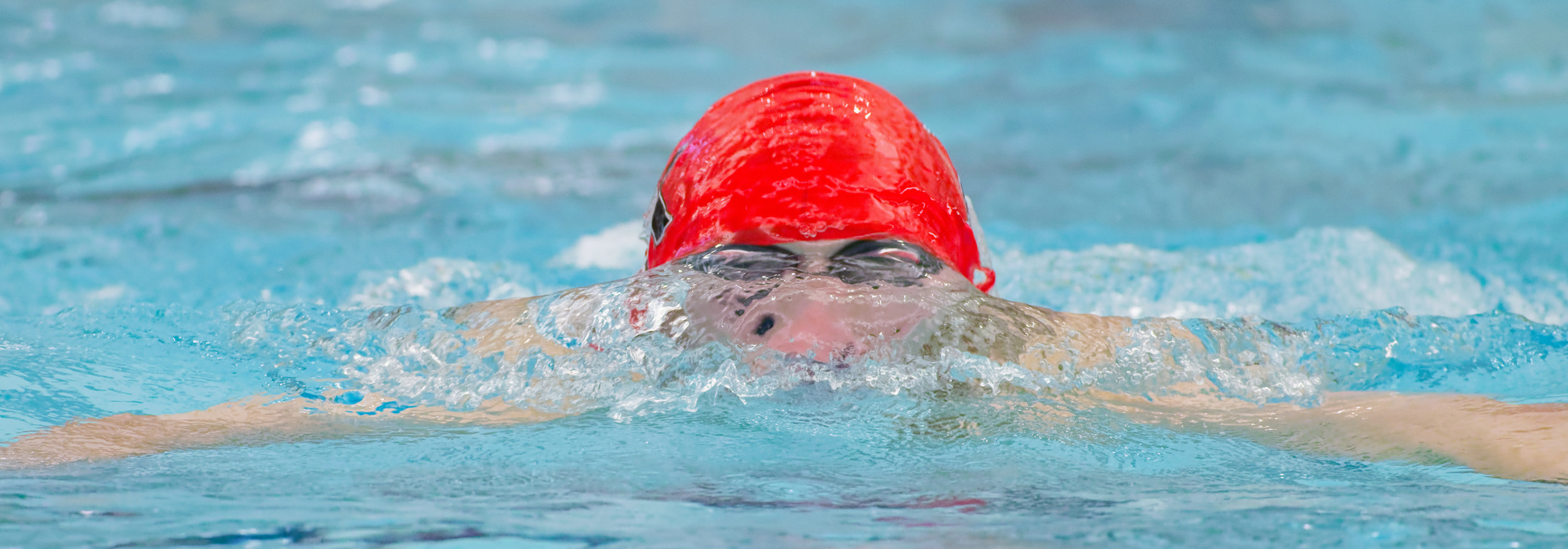 Boys swimming freestyle