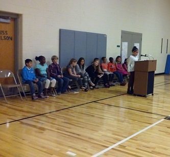 Students wait patiently while another Brookwood student makes their speech.