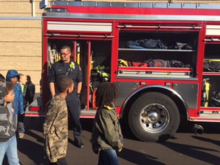 More students take a look at all the equipment.